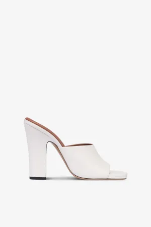 Mules in white leather