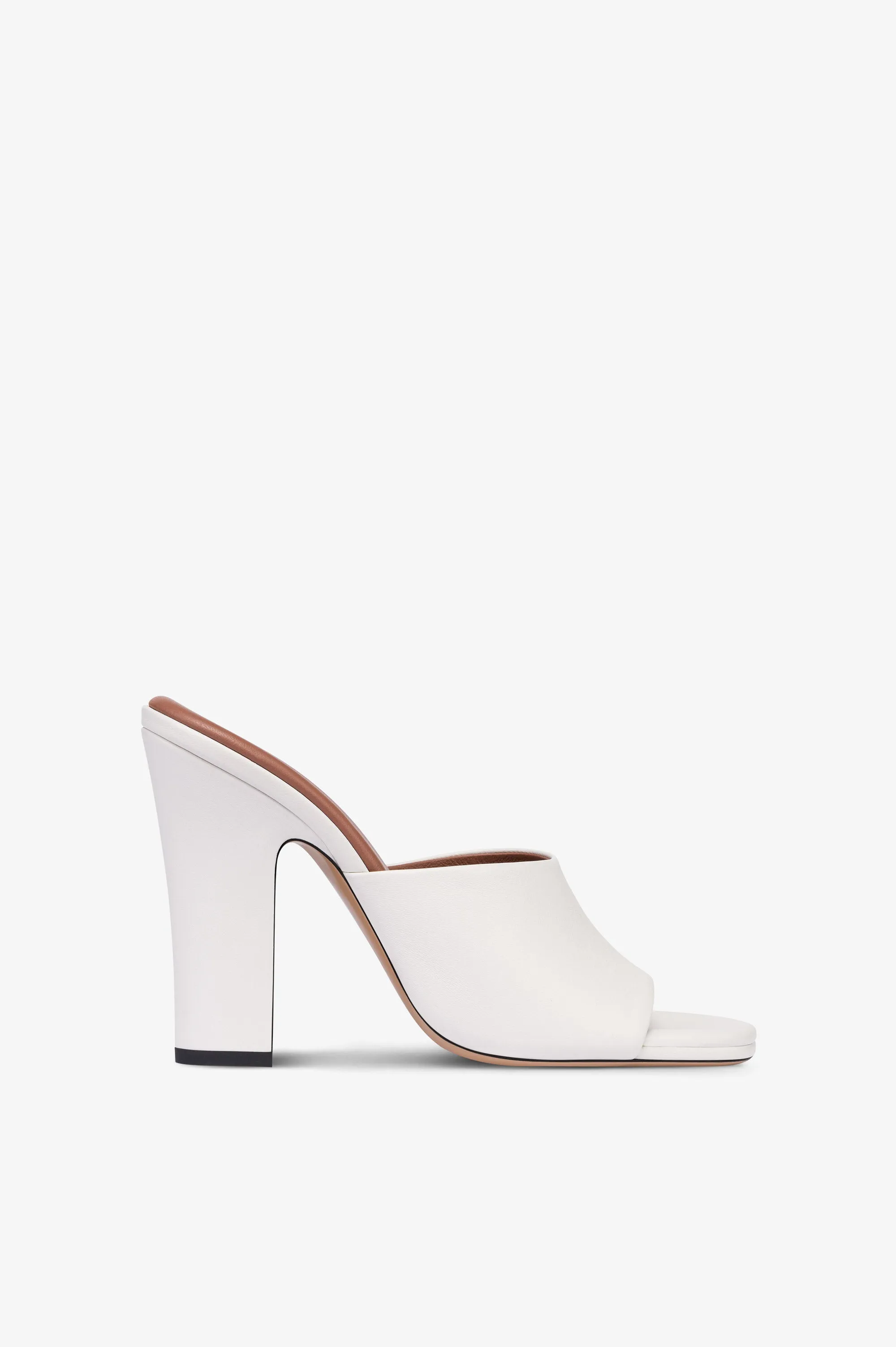 Mules in white leather