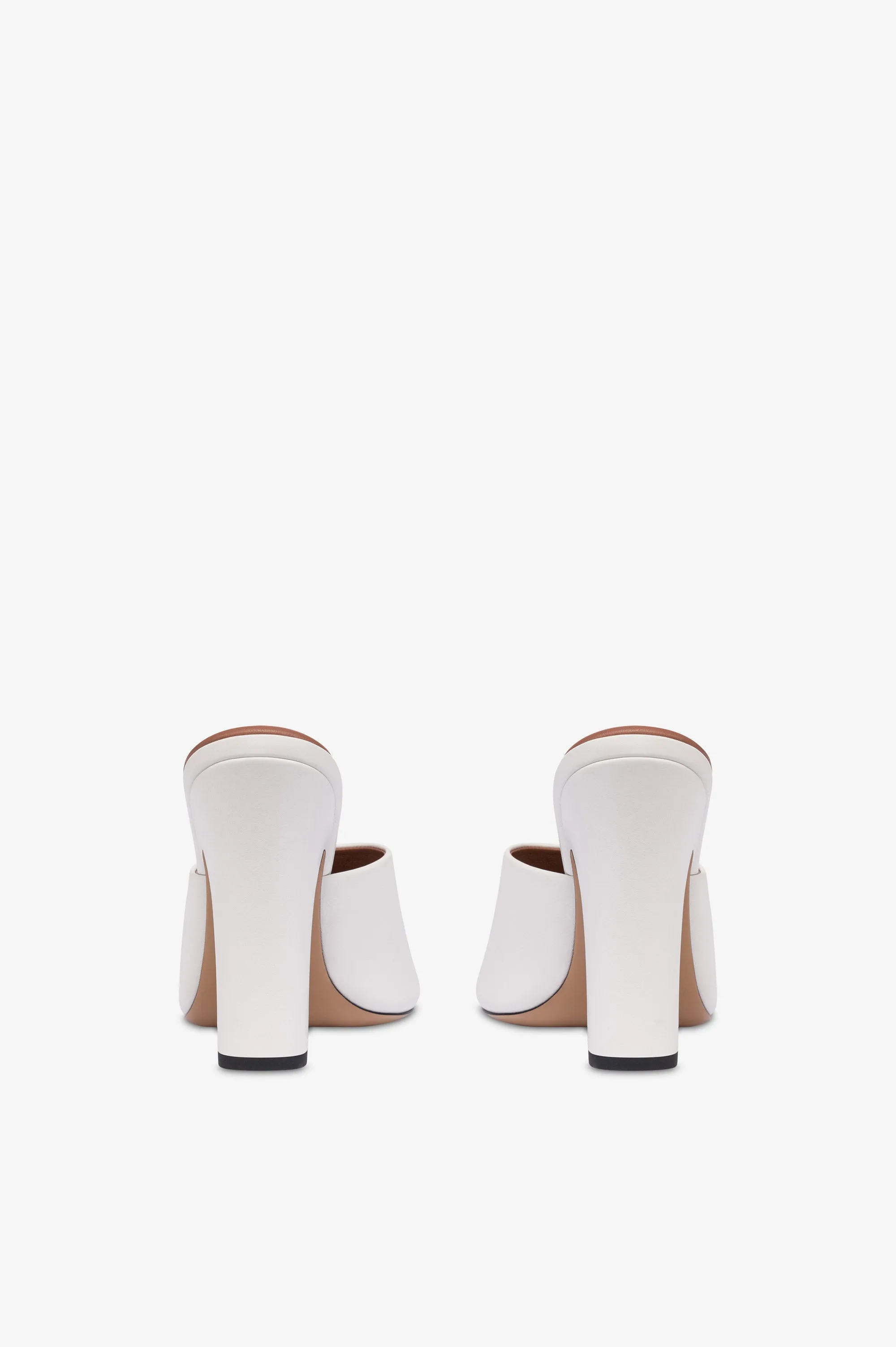 Mules in white leather