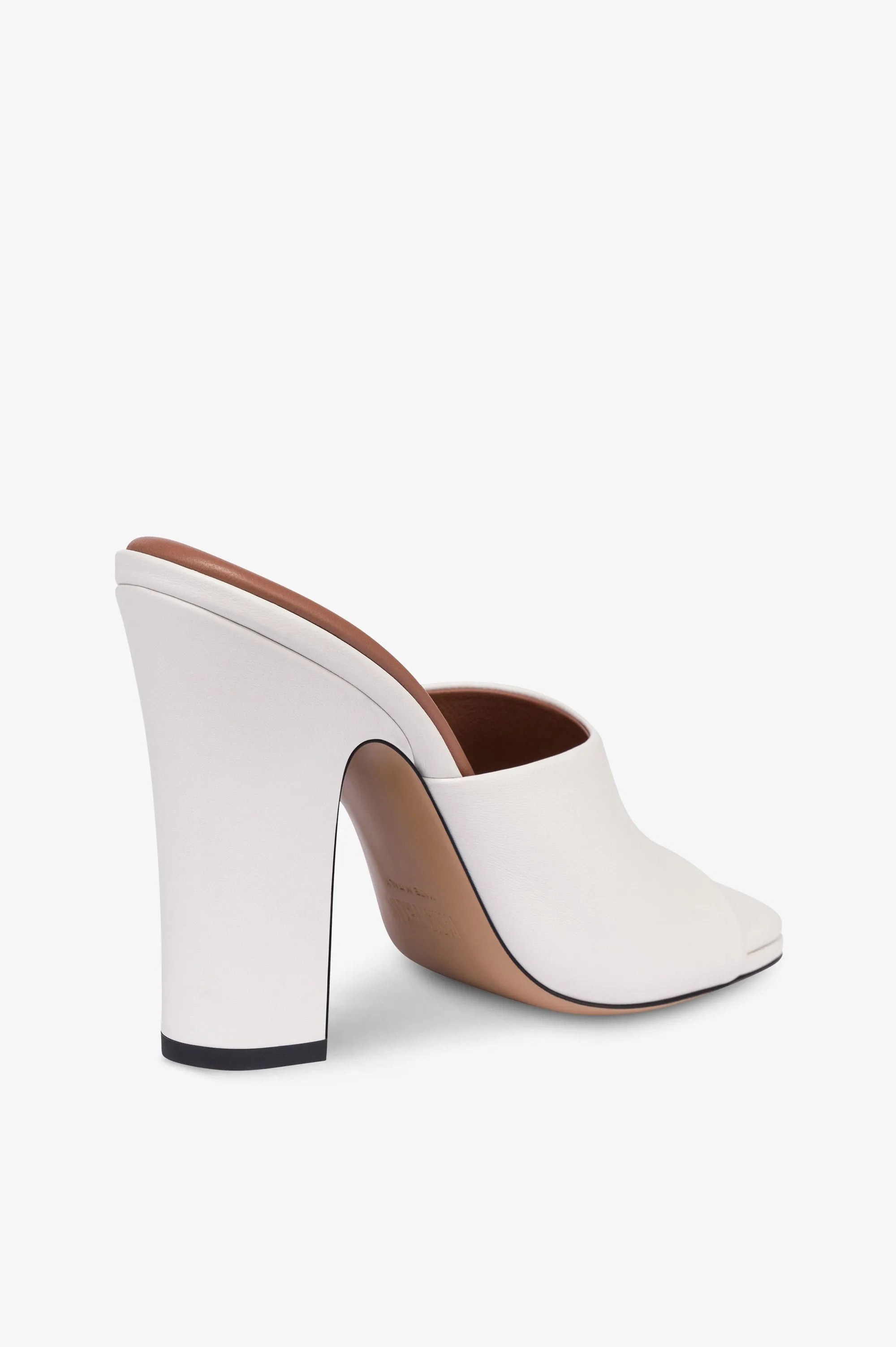 Mules in white leather